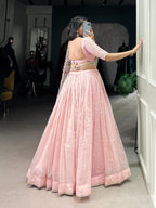Charming Baby Pink Tissue Silk Chaniya Choli with Pastel Floral Saree Drape