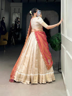 Royal Ivory Tissue Chaniya Choli with Scalloped Coral Pink Saree Drape