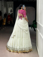 Charming Off-White Tiered Georgette Chaniya Choli with Magenta Brocade Blouse & Saree Drape