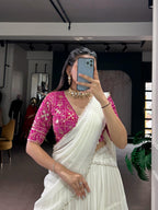 Charming Off-White Tiered Georgette Chaniya Choli with Magenta Brocade Blouse & Saree Drape