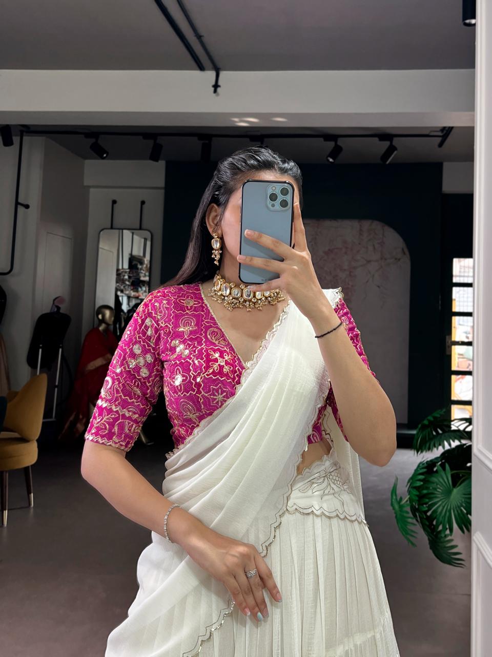 Charming Off-White Tiered Georgette Chaniya Choli with Magenta Brocade Blouse & Saree Drape