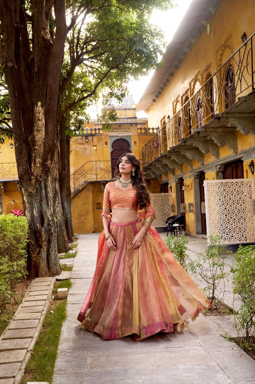 Regal Peach Pink Metallic Tissue Silk Chaniya Choli with Scalloped Zari Border Secondary image