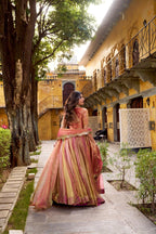 Regal Peach Pink Metallic Tissue Silk Chaniya Choli with Scalloped Zari Border