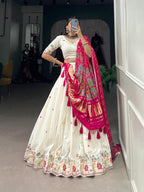 Elegant Off-White Silk Chaniya Choli with Vibrant Pink Zari Dupatta
