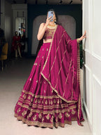 Regal Wine Silk Chaniya Choli with Intricate Gold Zari & Architectural Embroidery